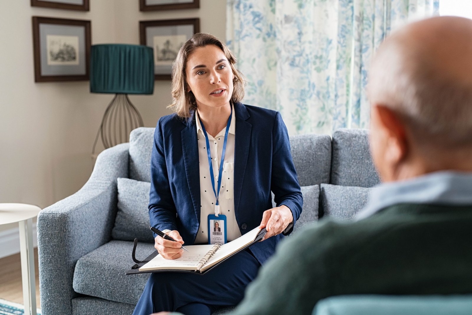 Mental health professional offering support to a patient.